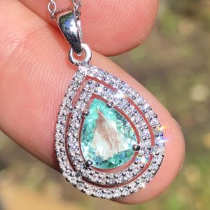 stunning natural 1.3ct Paraiba tourmaline & Diamond set statement pendant set into solid 18ct white gold